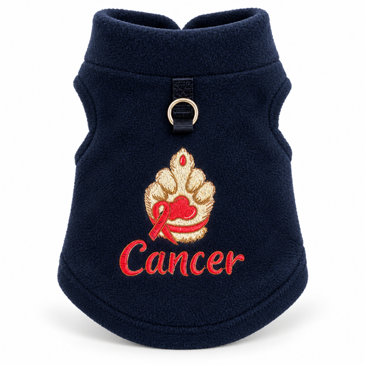 A navy blue fleece pet sweater with an embroidered design featuring a gold and red paw print with a red ribbon and the word 'Cancer' in red script.