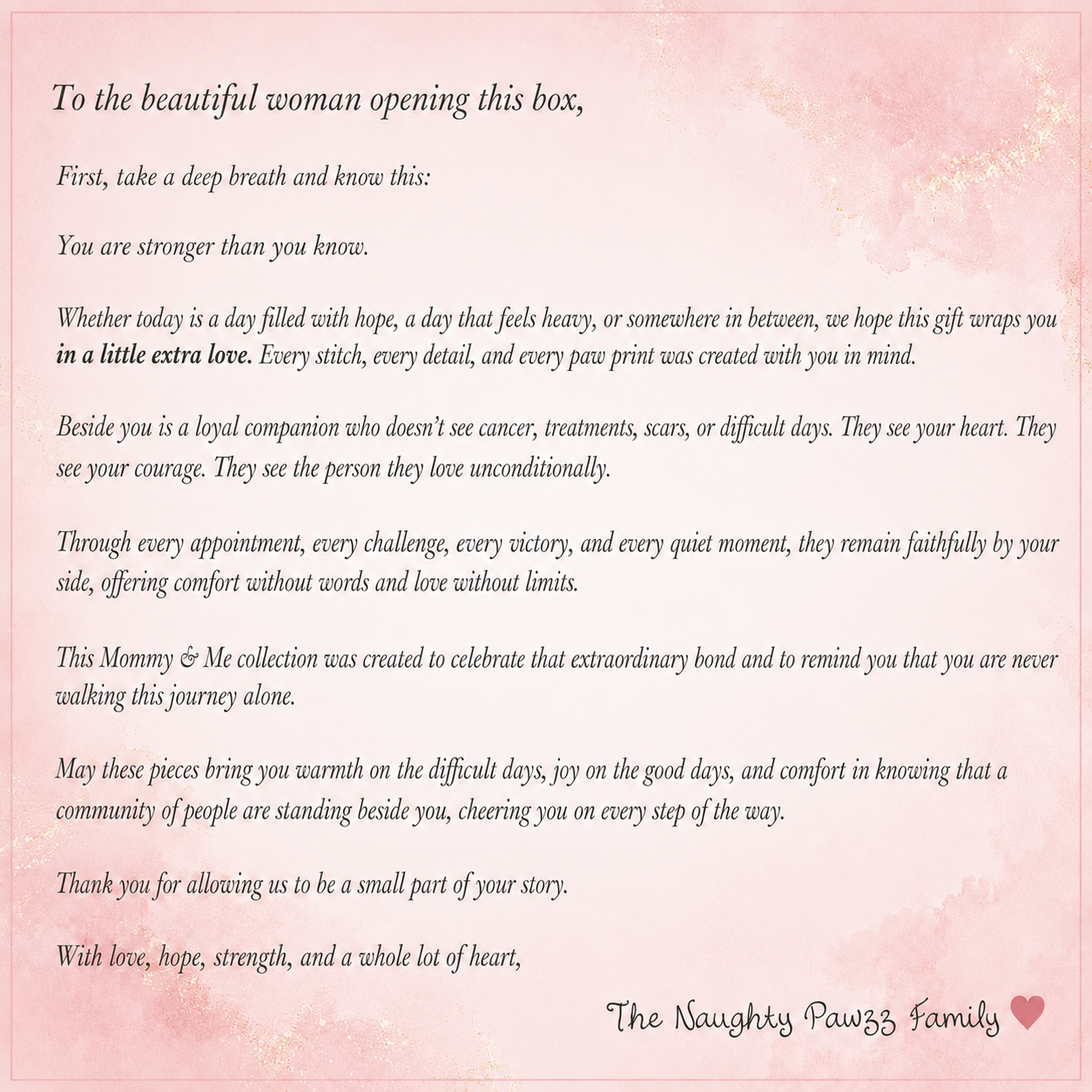 A square card with a soft pink textured background and elegant black text, featuring a sentimental message addressed to the woman opening a gift box. The card is signed 'The Naughty Pawz Family' with a small heart at the bottom right.